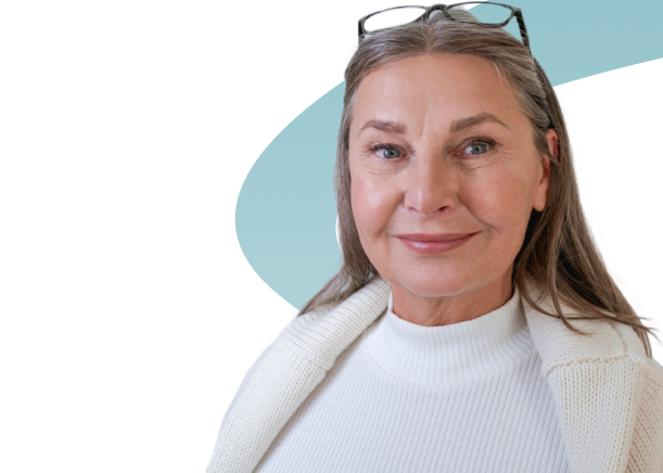 A 60-70 year old female with long gray hair, wearing glasses on top of their head, is dressed in a white turtleneck sweater and a cream-colored cardigan. The background features abstract shapes in shades of blue and gray.